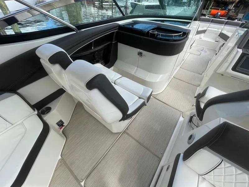 Slide: The Image of 2018 Sea Ray 350 SLX boat interior with luxurious seating and modern design. - 10