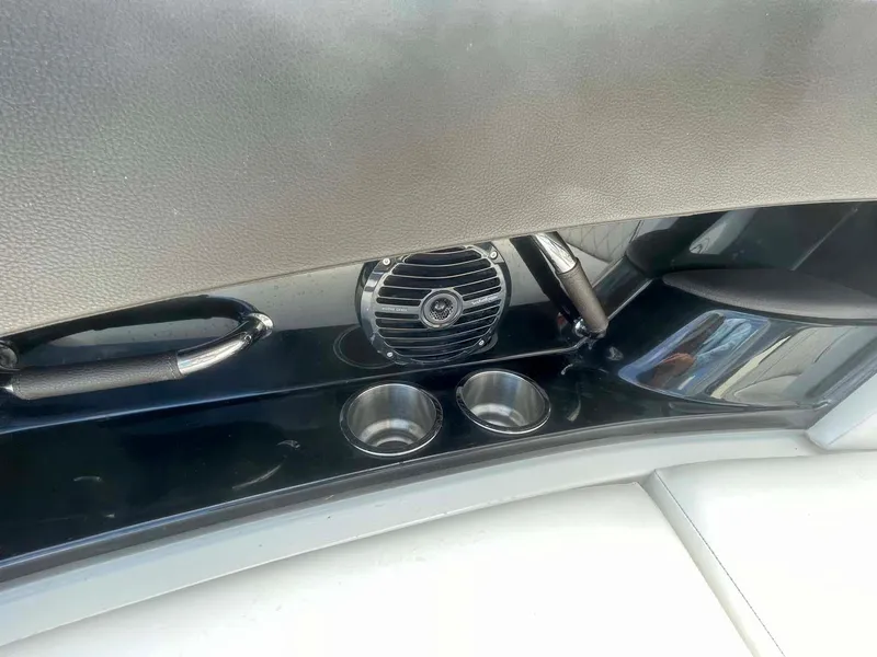 Slide: The Image of Interior of 2018 Sea Ray 350 SLX boat with cup holders and speaker. - 11