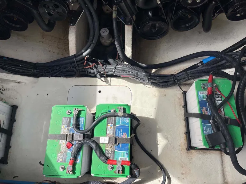 Slide: The Image of Engine compartment of 2018 Sea Ray 350 SLX with batteries and wiring. - 29