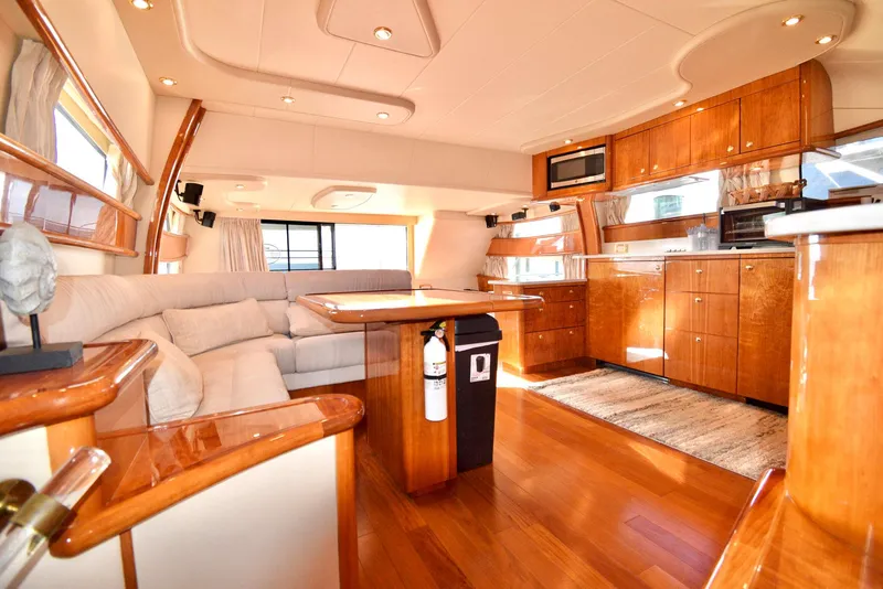 Slide: The Image of Luxurious interior of 2010 Neptunus 58 yacht with elegant wood finishes and modern amenities. - 10
