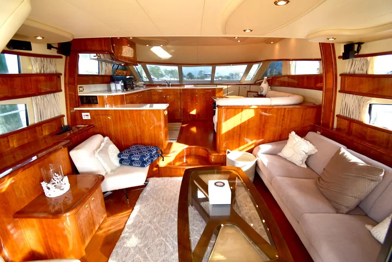 Slide: The Image of Luxurious 2010 Neptunus 58 yacht interior with elegant wood finishes and modern furnishings. - 4