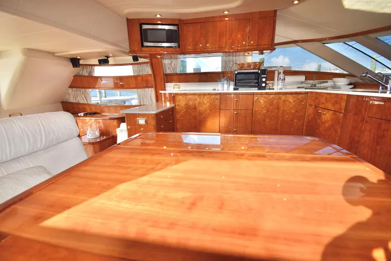 Slide: The Image of Luxurious Neptunus 58 yacht interior with elegant wood finishes, 2010 model. - 9