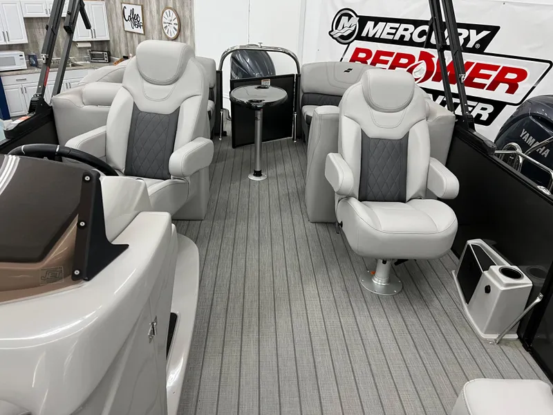 Slide: The Image of 2024 Starcraft SLS 5 Q DH boat interior with plush seating and modern design. - 4