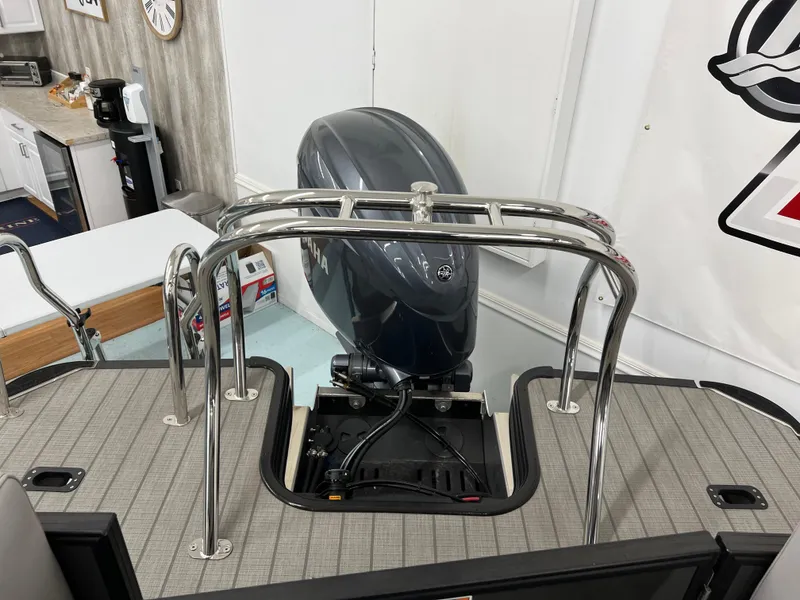 Slide: The Image of 2024 Starcraft SLS 5 Q DH boat with outboard motor and stainless steel railing. - 8