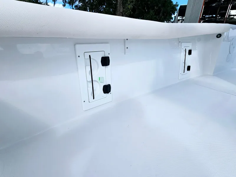 Slide: The Image of 2025 Sea Hunt BX 25 FS boat interior with storage compartments. - 12