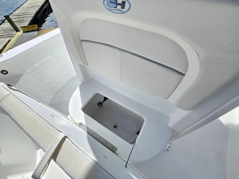 Slide: The Image of 2025 Sea Hunt BX 25 FS boat interior with storage compartment. - 24