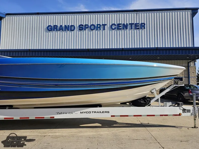 Slide: The Image of 2008 Outerlimits 46 Limited boat on trailer at Grand Sport Center. - 14