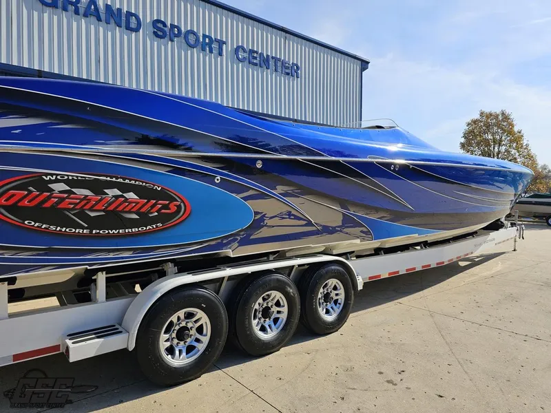 Slide: The Image of 2008 Outerlimits 46 Limited powerboat on trailer at Grand Sport Center. - 9