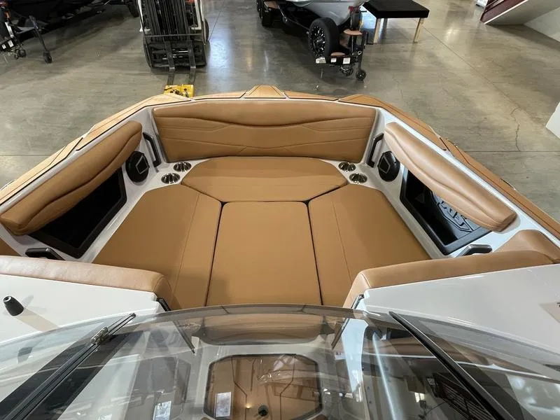 Slide: The Image of 2025 Axis A245 boat interior with tan leather seating and modern design. - 18