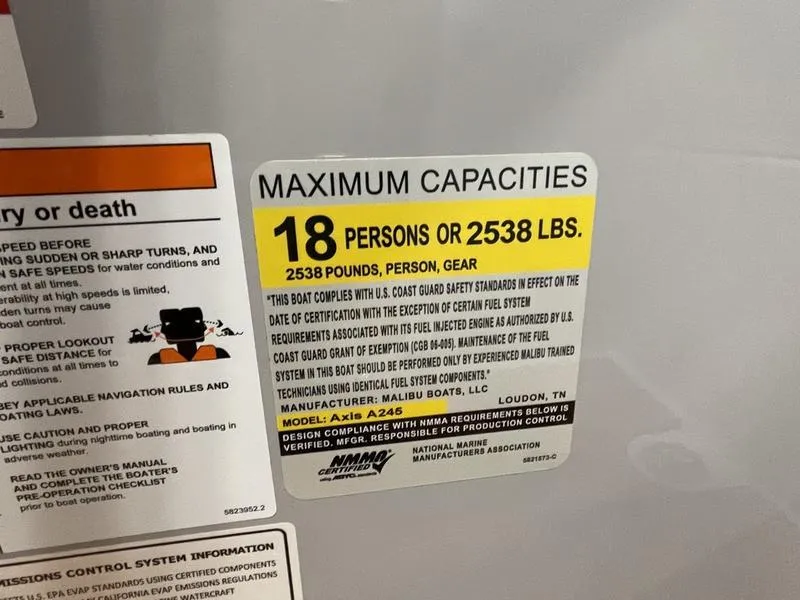 Slide: The Image of Maximum capacity label for Axis A245 boat, 2025 model, 18 persons or 2538 lbs. - 19