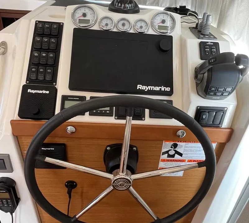 Slide: The Image of Beneteau Swift Trawler 41 helm with Raymarine electronics, 2021 model. - 19
