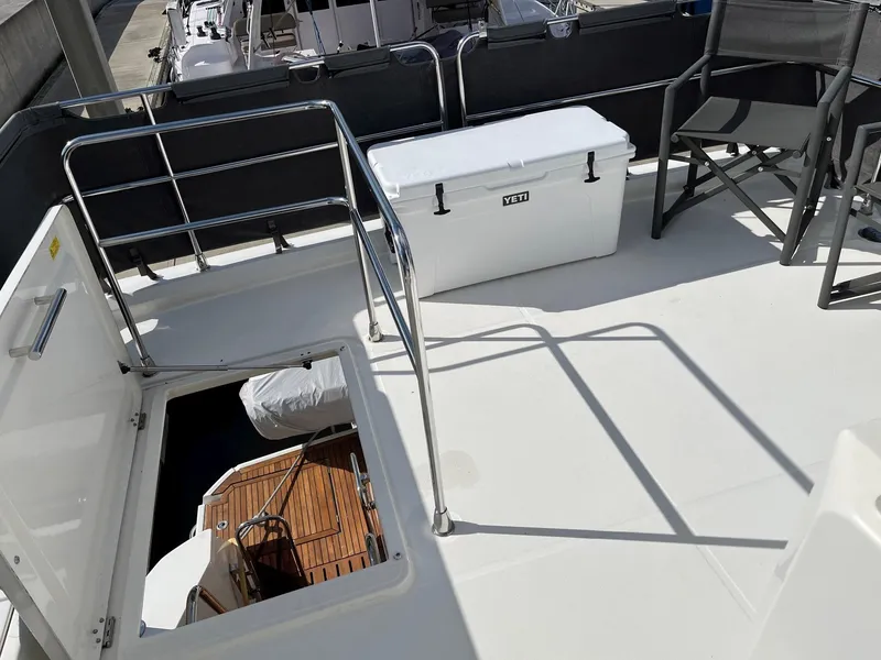 Slide: The Image of Beneteau Swift Trawler 41 deck with Yeti cooler and seating, 2021 model. - 46