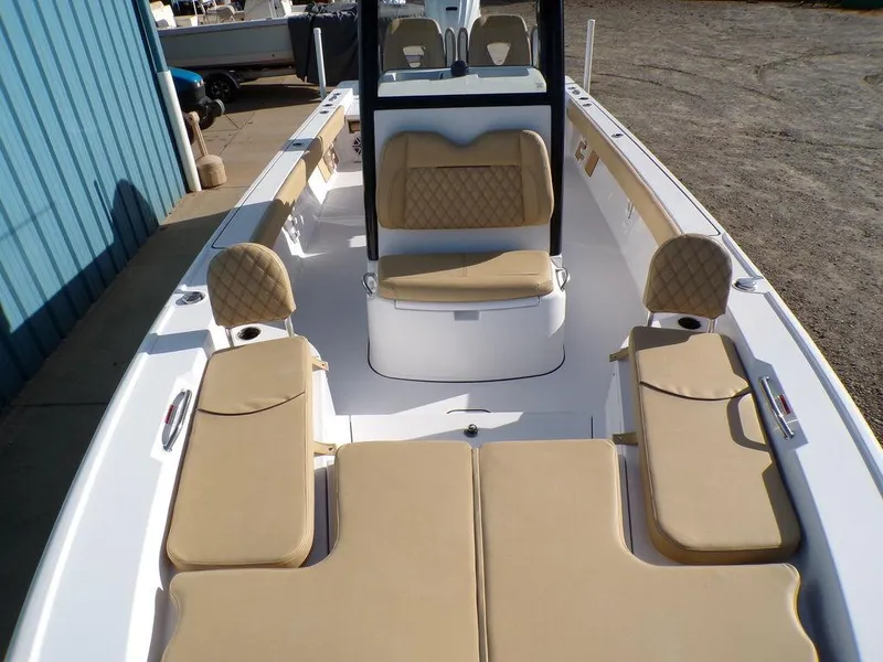 Slide: The Image of 2025 Sportsman Masters 267 boat with tan seating and spacious deck layout. - 10
