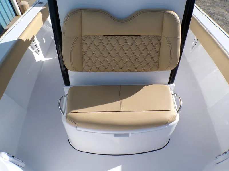 Slide: The Image of 2025 Sportsman Masters 267 boat seating with tan cushions and diamond stitching. - 14