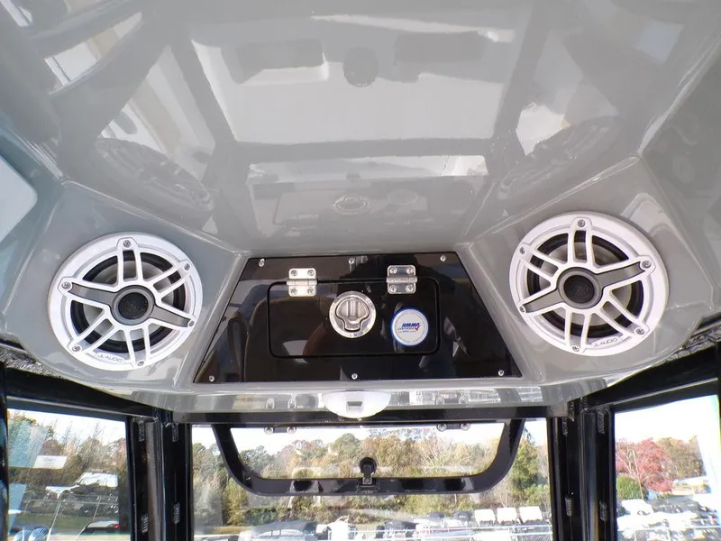 Slide: The Image of 2025 Sportsman Masters 267 boat speakers and control panel. - 19