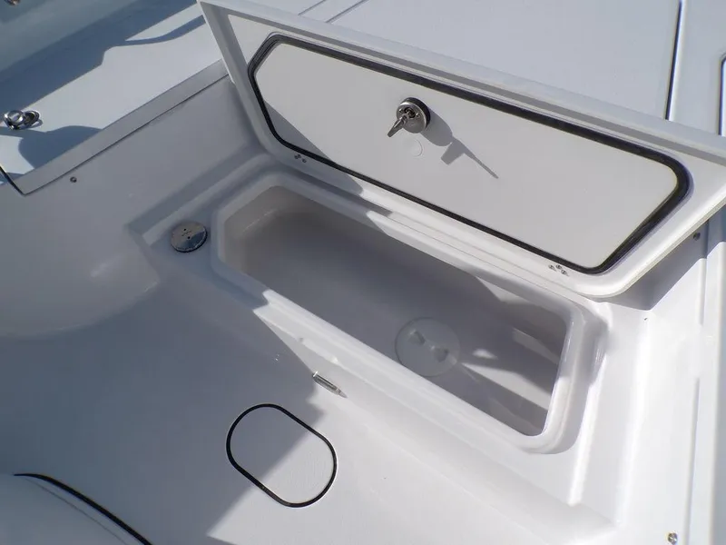 Slide: The Image of Open storage compartment on 2025 Sportsman Masters 267 boat. - 28