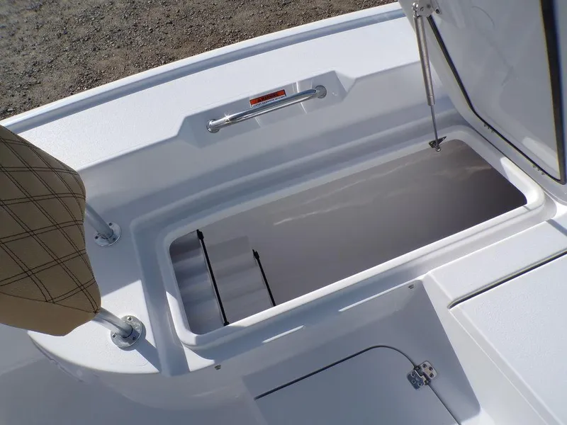 Slide: The Image of 2025 Sportsman Masters 267 boat storage compartment open, showcasing spacious interior. - 29