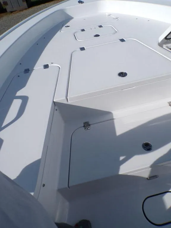Slide: The Image of 2025 Sportsman Masters 267 boat deck with storage compartments. - 30
