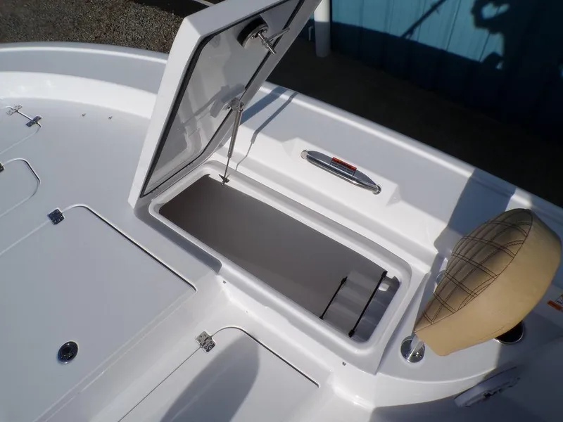 Slide: The Image of Open storage compartment on 2025 Sportsman Masters 267 boat deck. - 32