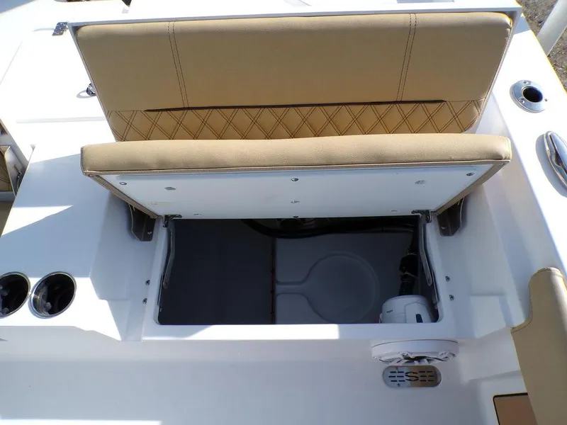 Slide: The Image of 2025 Sportsman Masters 267 boat seat with storage compartment open. - 35