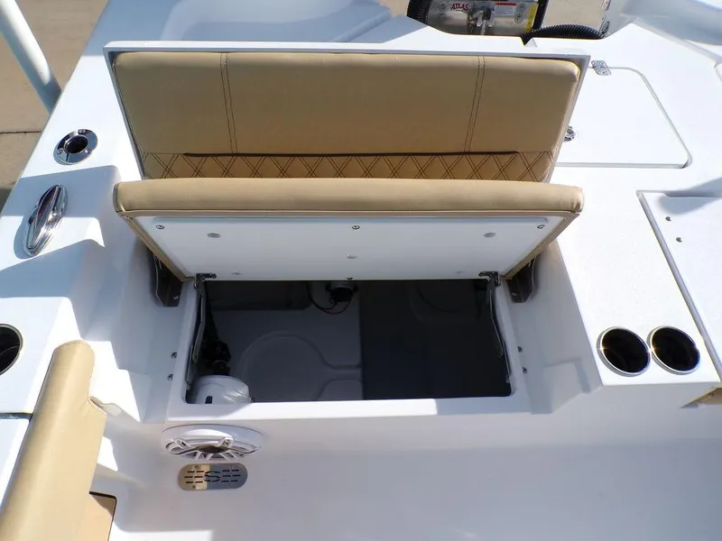Slide: The Image of 2025 Sportsman Masters 267 boat seat with storage compartment and cup holders. - 37