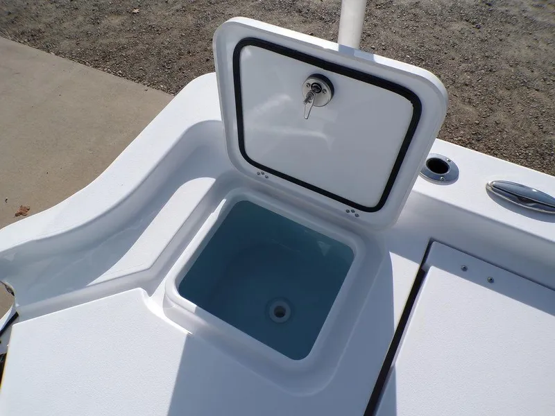 Slide: The Image of Open storage compartment on 2025 Sportsman Masters 267 boat. - 41