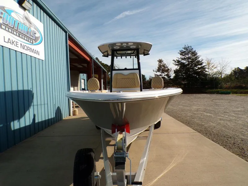Slide: The Image of 2025 Sportsman Masters 267 boat on trailer at Lake Norman dealership. - 5