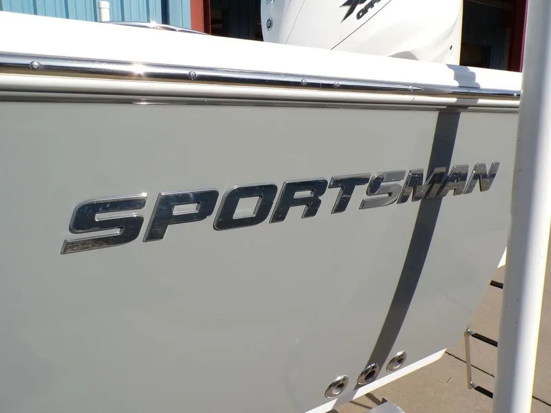 Slide: The Image of 2025 Sportsman Masters 267 boat side view with logo. - 8