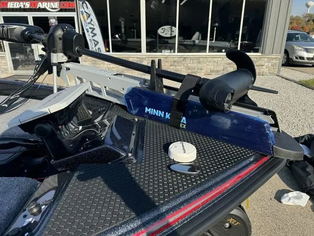 Slide: The Image of Phoenix 819 ZXL 2025 boat with Minn Kota trolling motor on deck. - 11