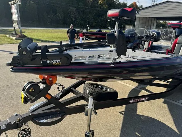Slide: The Image of 2025 Phoenix 819 ZXL boat on trailer with Minn Kota Ultrex motor. - 13