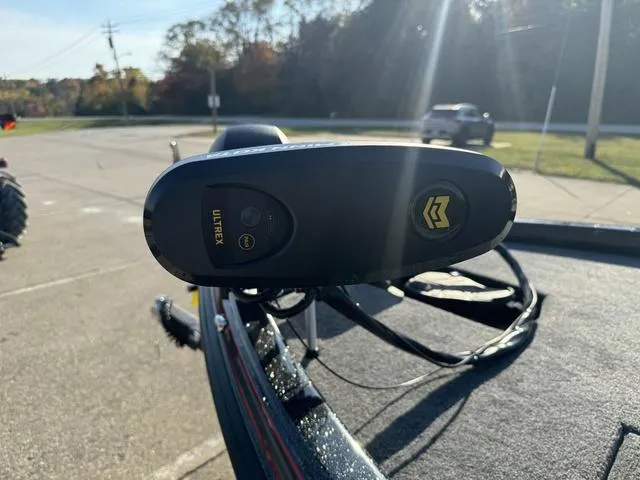 Slide: The Image of Close-up of a 2025 Phoenix 819 ZXL boat with Ultrex motor in a parking lot. - 15