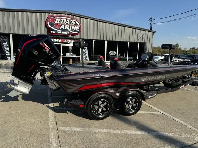 Slide: The Image of 2025 Phoenix 819 ZXL boat at Wieda's Marine dealership. - 2