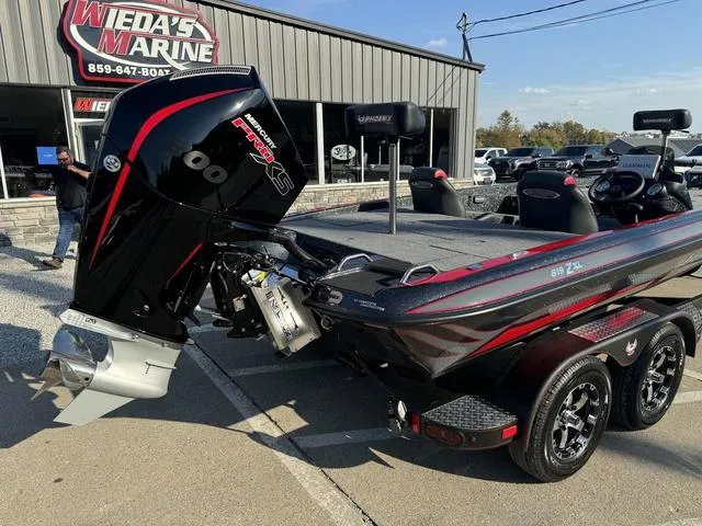 Slide: The Image of 2025 Phoenix 819 ZXL boat with powerful engine at Wieda's Marine dealership. - 3