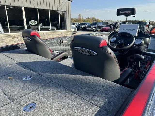 Slide: The Image of 2025 Phoenix 819 ZXL boat interior with Garmin navigation system, featuring comfortable seating. - 5