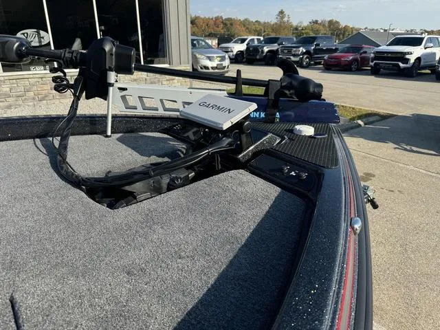 Slide: The Image of 2025 Phoenix 819 ZXL boat with Garmin navigation system, parked outdoors. - 9