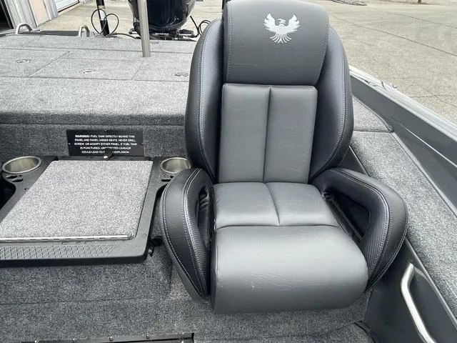 Slide: The Image of 2025 Phoenix 721 ZXL boat seat with sleek black and gray design. - 20