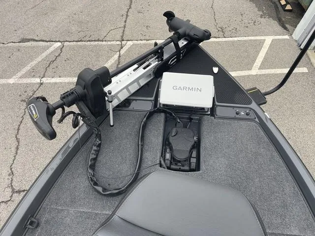 Slide: The Image of 2025 Phoenix 721 ZXL boat with Garmin navigation system and trolling motor. - 9