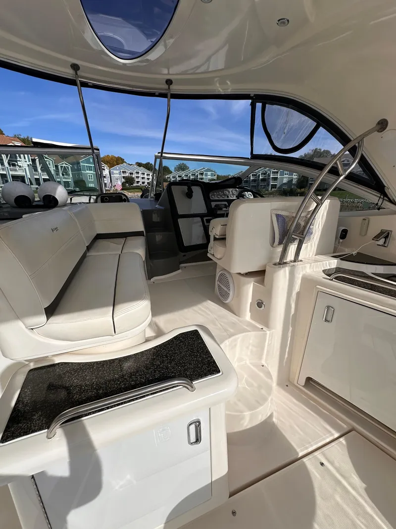 Slide: The Image of Interior of 2006 Cruisers Yachts 420 Express, featuring sleek seating and modern design. - 6