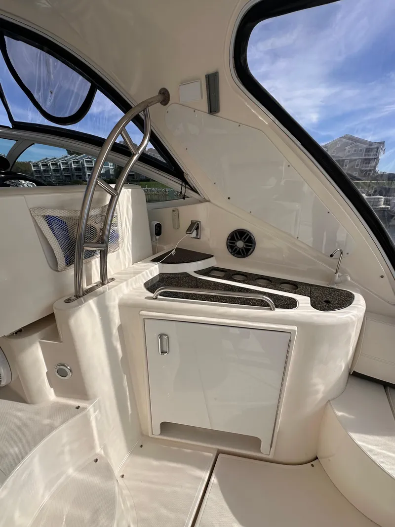 Slide: The Image of 2006 Cruisers Yachts 420 Express interior with sleek design and modern amenities. - 7
