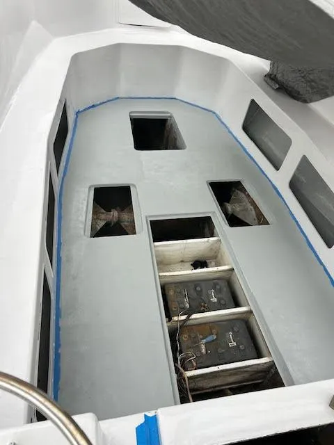Slide: The Image of Interior view of a 1969 Webbers Cove 39 boat, showing battery compartment and ventilation. - 2