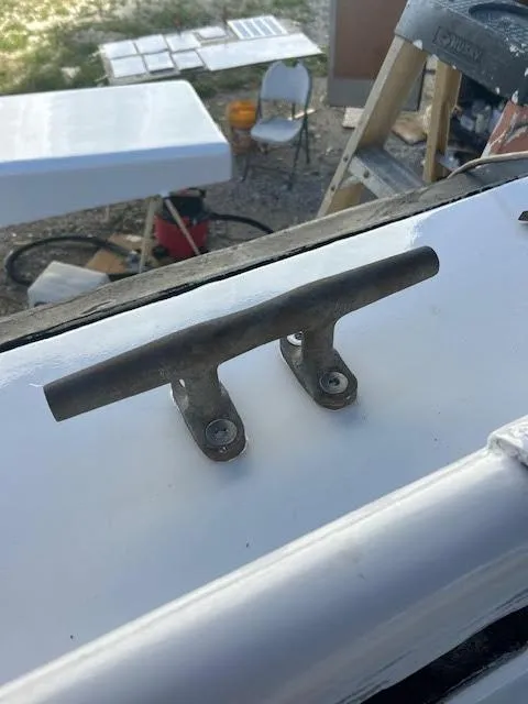 Slide: The Image of Webbers Cove 39 (1969) boat cleat on deck, outdoor setting. - 7