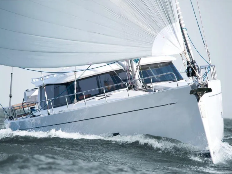 Slide: The Image of Sailing yacht Moody 54 DS 2025 gliding through ocean waves. - 4