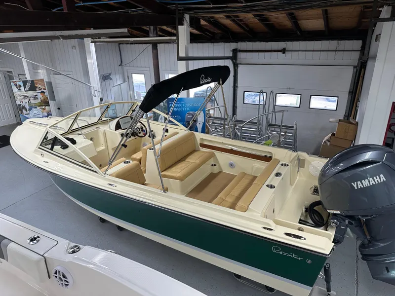 Slide: The Image of 2025 Rossiter 20 Day Boat with Yamaha engine in showroom. - 2