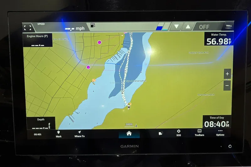Slide: The Image of Garmin navigation display on 2021 Scout 305 LXF boat, showing map and water temperature. - 31