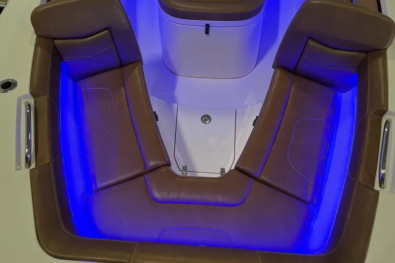 Slide: The Image of 2021 Scout 305 LXF boat interior with blue LED lighting. - 40