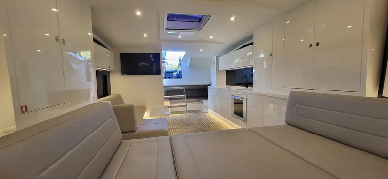 Slide: The Image of Luxurious interior of 2023 VanDutch 56 yacht with modern furnishings and sleek design. - 22
