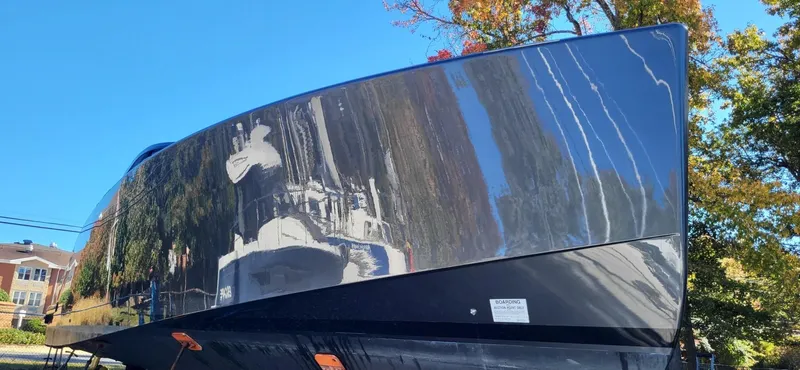 Slide: The Image of Luxurious interior of 2023 VanDutch 56 yacht with modern kitchen design. - 31