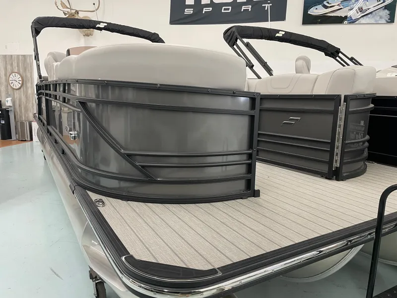The Image of 2024 Starcraft SLS 5 pontoon boat with sleek design and spacious seating. - 0