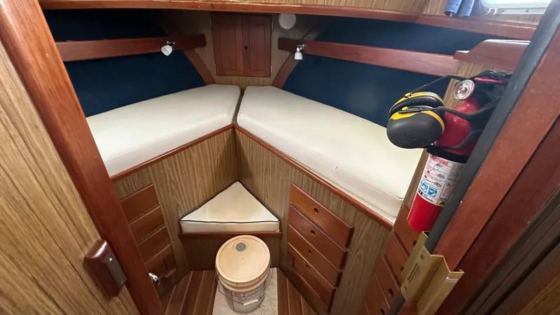 Slide: The Image of 1972 Bristol 42 Offshore Trawler cabin interior with V-berth and fire extinguisher. - 22