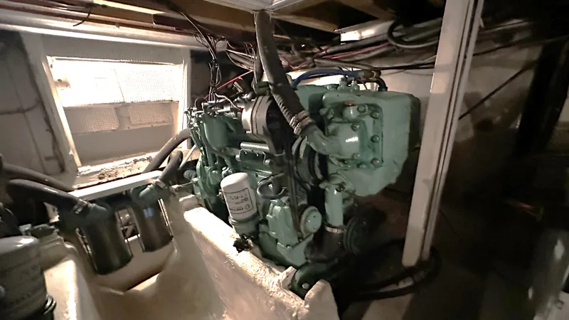 Slide: The Image of Engine room of 1972 Bristol 42 Offshore Trawler with visible machinery and components. - 27